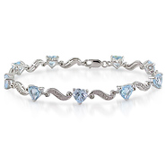 Sterling Silver .02 ctw & 8.4 CT TGW Blue Topaz Bracelet
