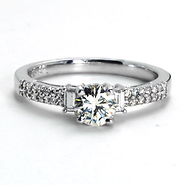 18k WG Round Center Engagement Ring w/ Baguette and Round Sidestones .61 ct center, 0.25ct side